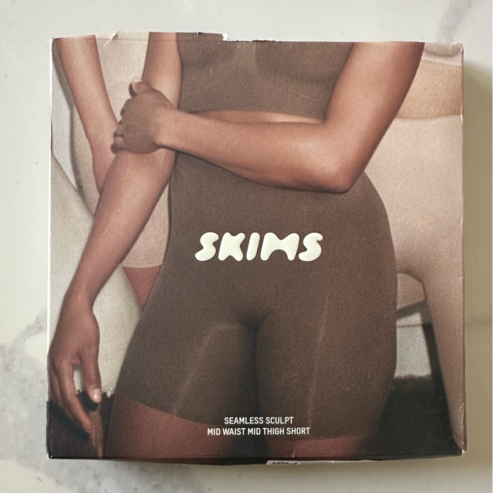 Skims Seamless Sculpt Mid Waist Mid Thigh Shorts in Sand